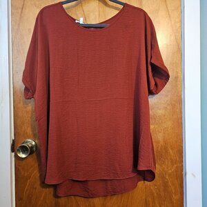 Rust colored blouse from Maurice's